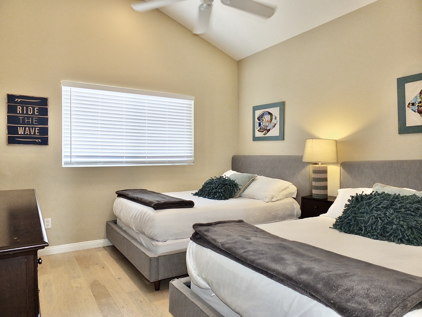 The third bedroom provides two full beds, Smart TV & closet