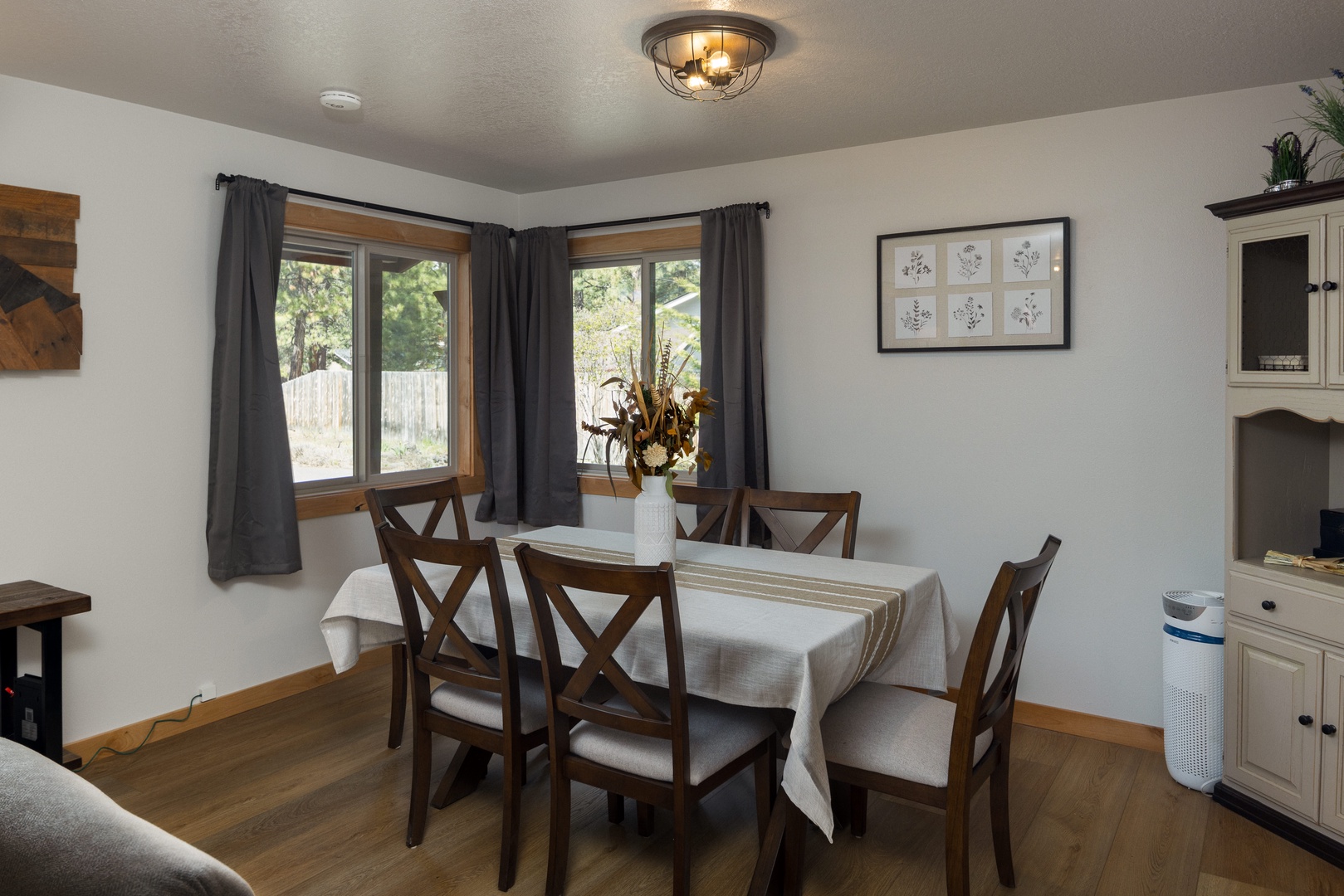 Gather around our dining table, with ample seating for six