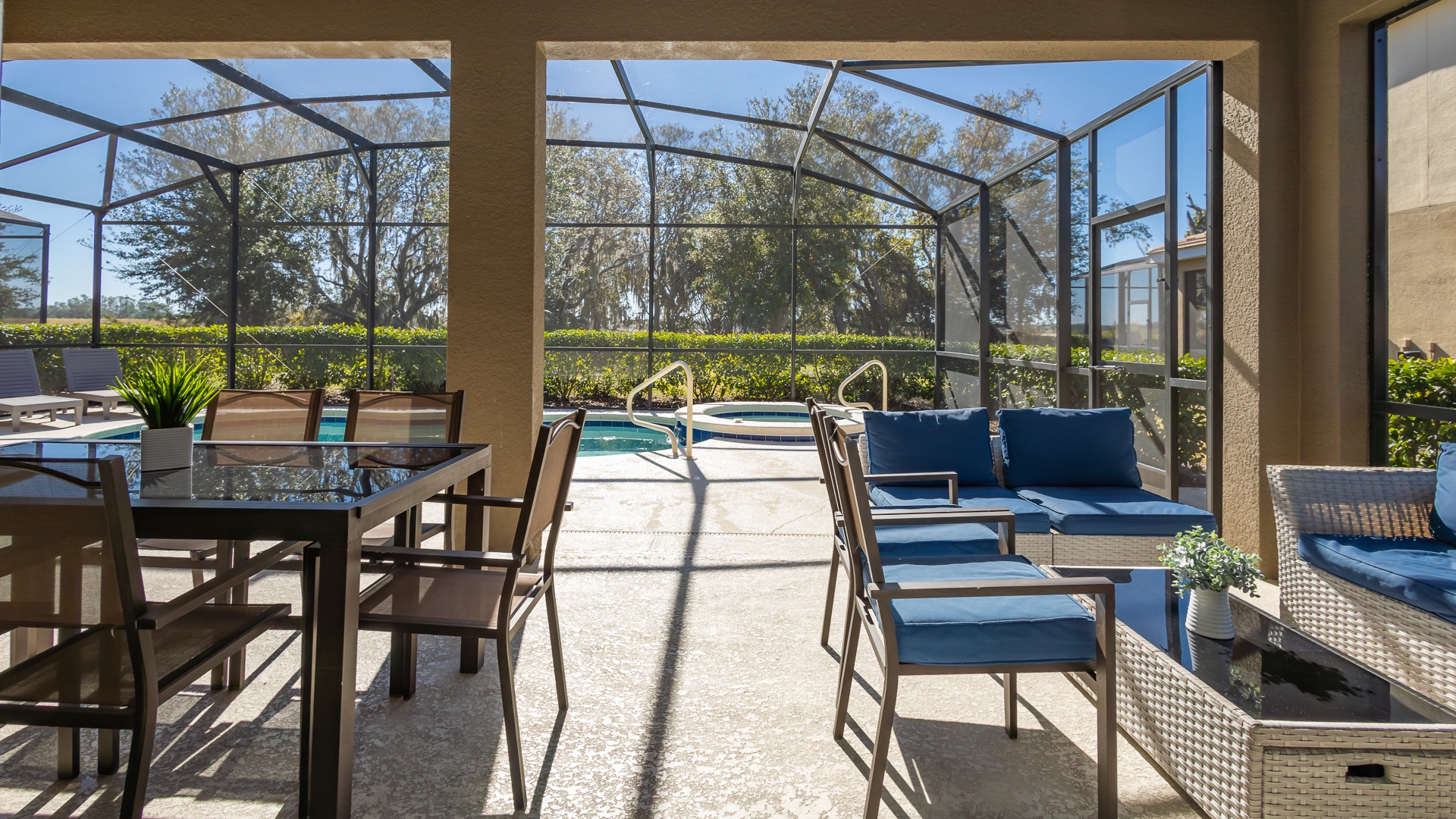 Dine alfresco or enjoy a cocktail on the screened patio