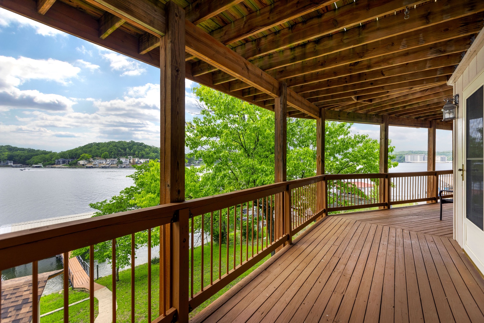 Discover expansive lower-level deck space, perfect for relaxation and entertaining alike