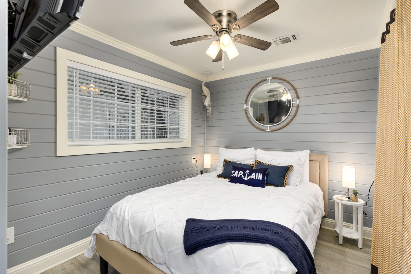 The cabin’s serene queen bedroom includes a Smart TV for evening relaxation