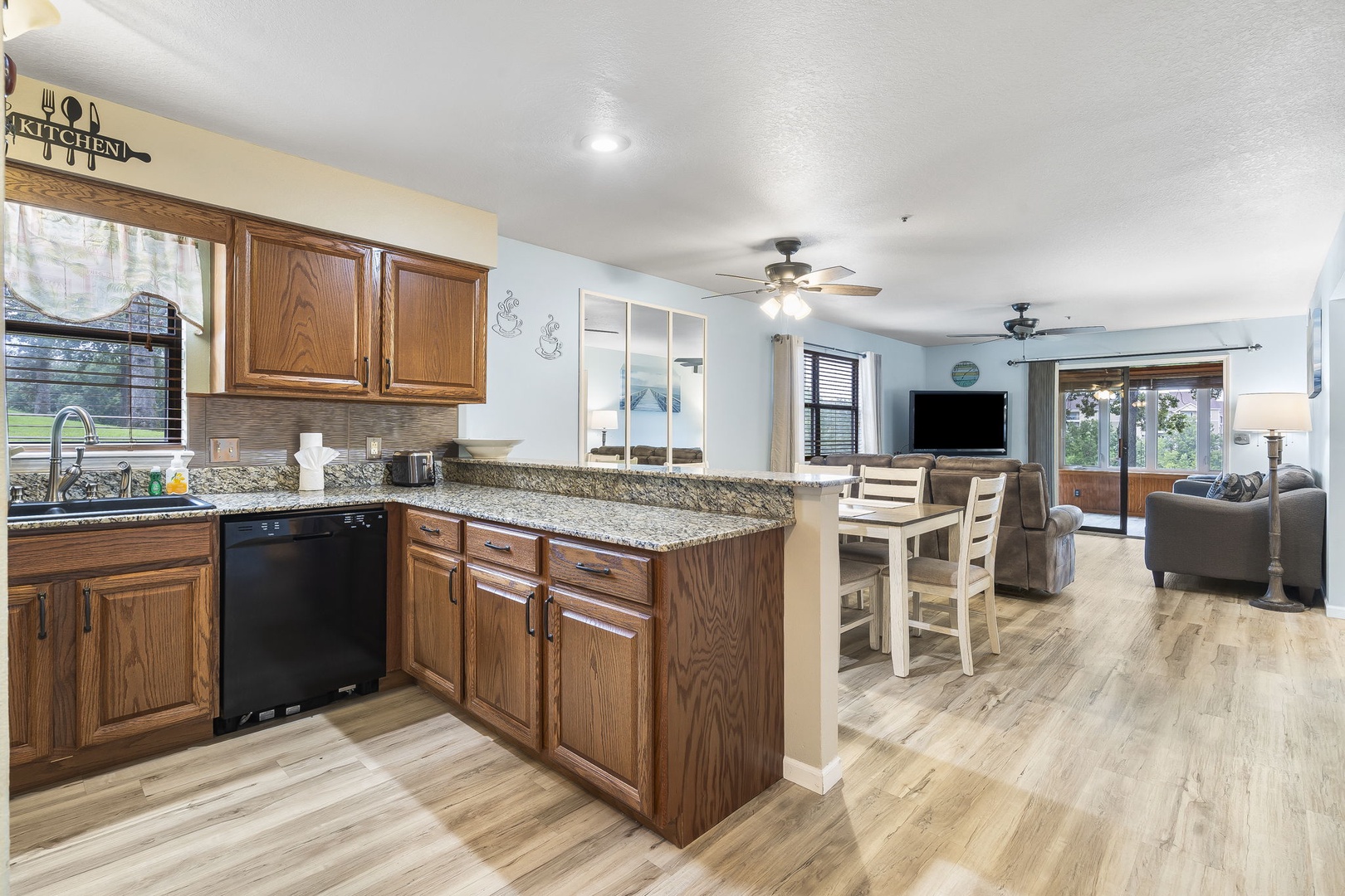 Enjoy the breezy, open layout between the kitchen & dining/living spaces