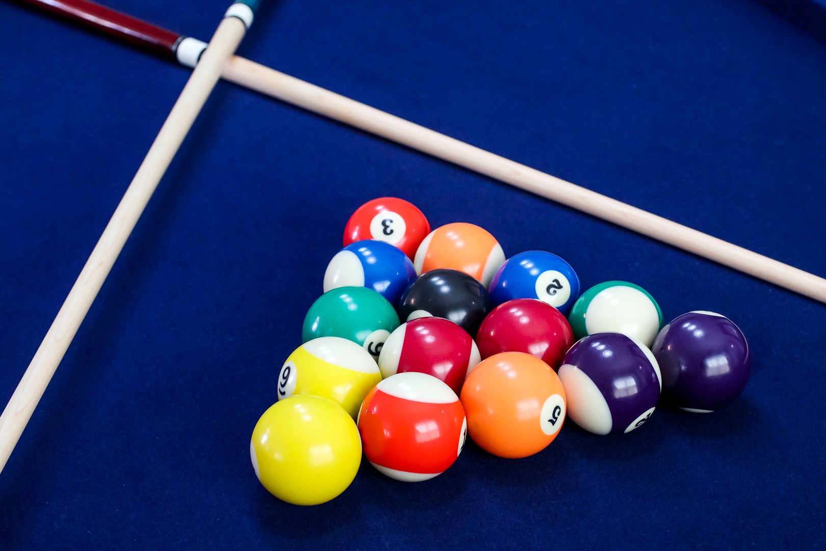 Billiard balls and sticks