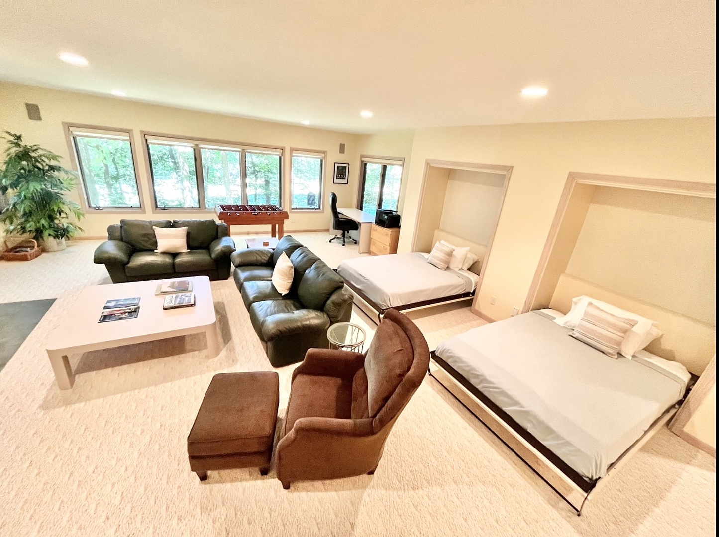 A pair of queen-sized Murphy beds await in the walk-out lower-level living space