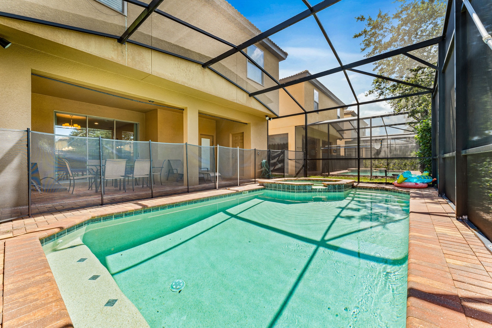 Screened in pool with outdoor seating