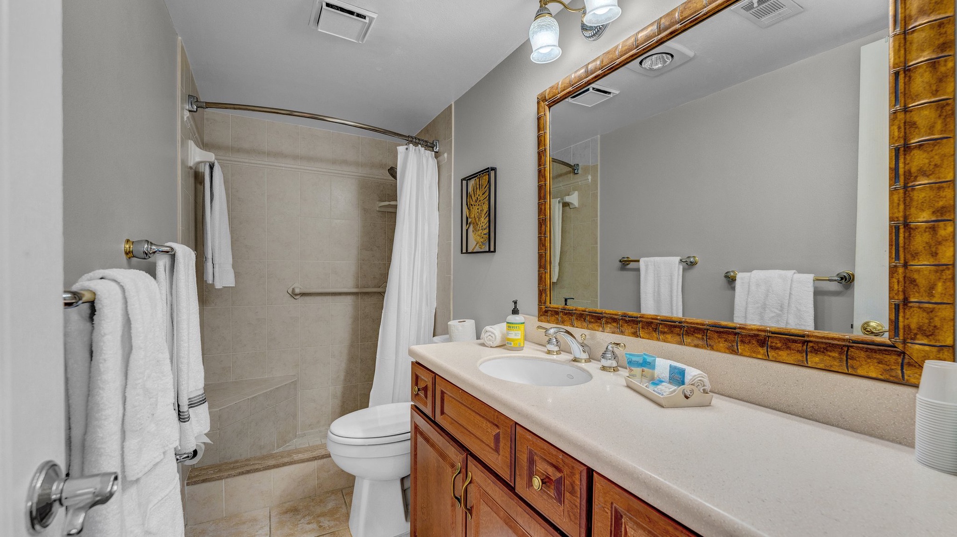 The 2nd floor king en suite boasts an oversized single vanity & shower