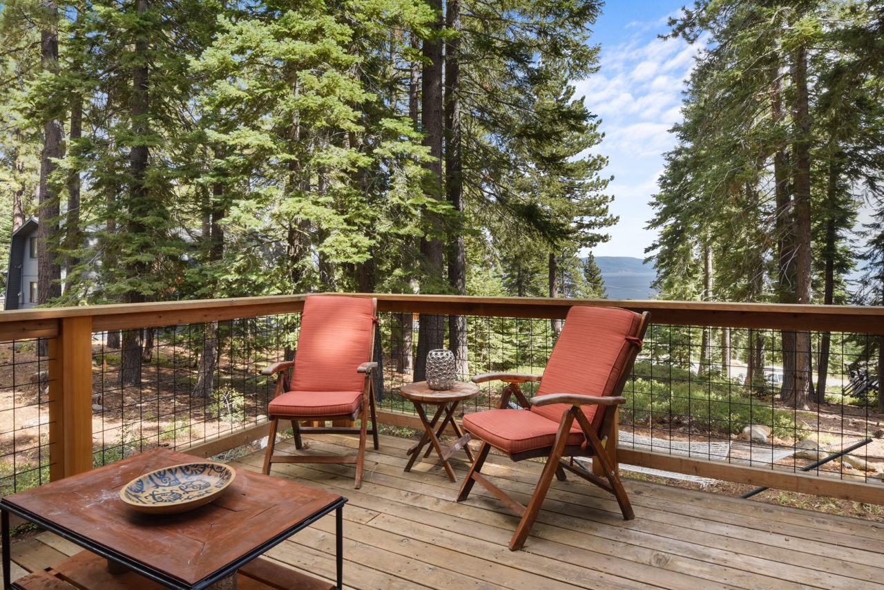 Outdoor seating with mountain and filtered lake views