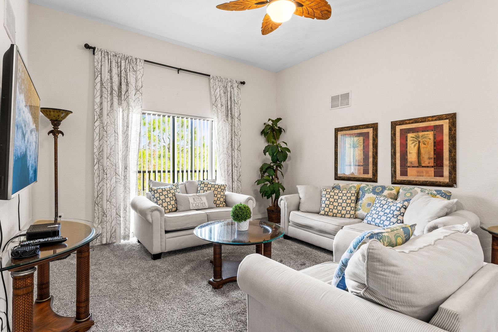 Cozy living room featuring a smart TV and a full-size sleeper sofa