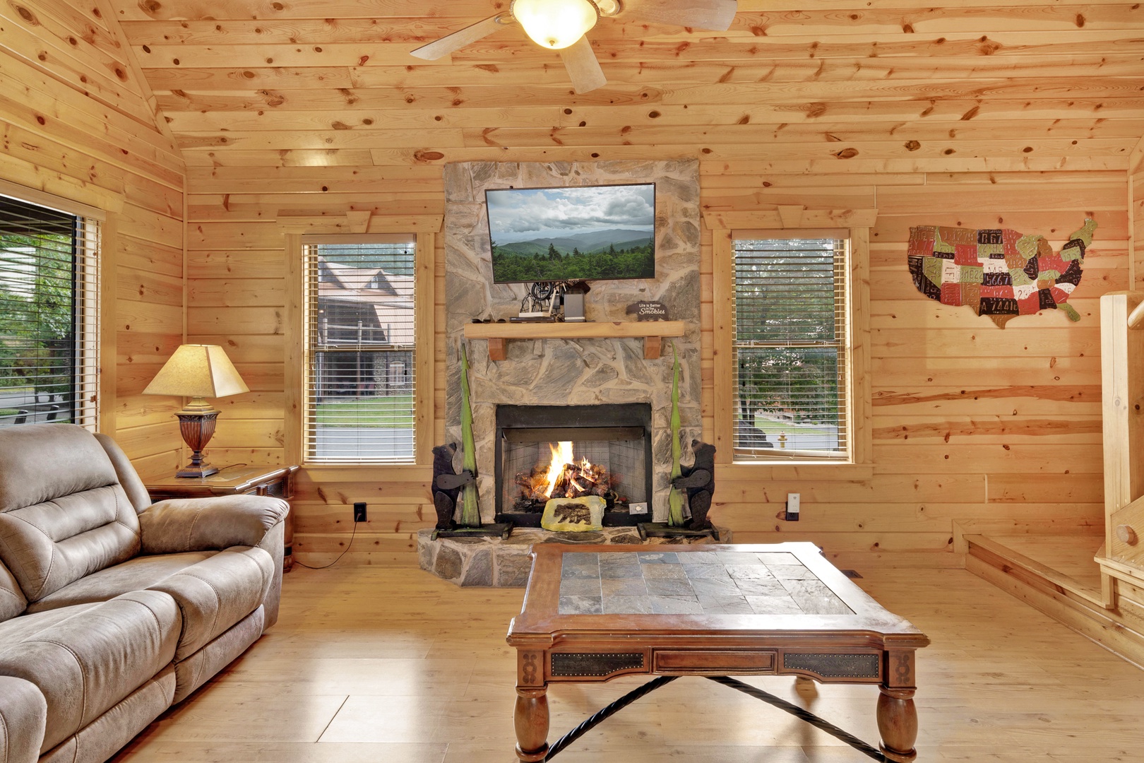 Curl up in the living room & enjoy a movie by the seasonally-available fireplace