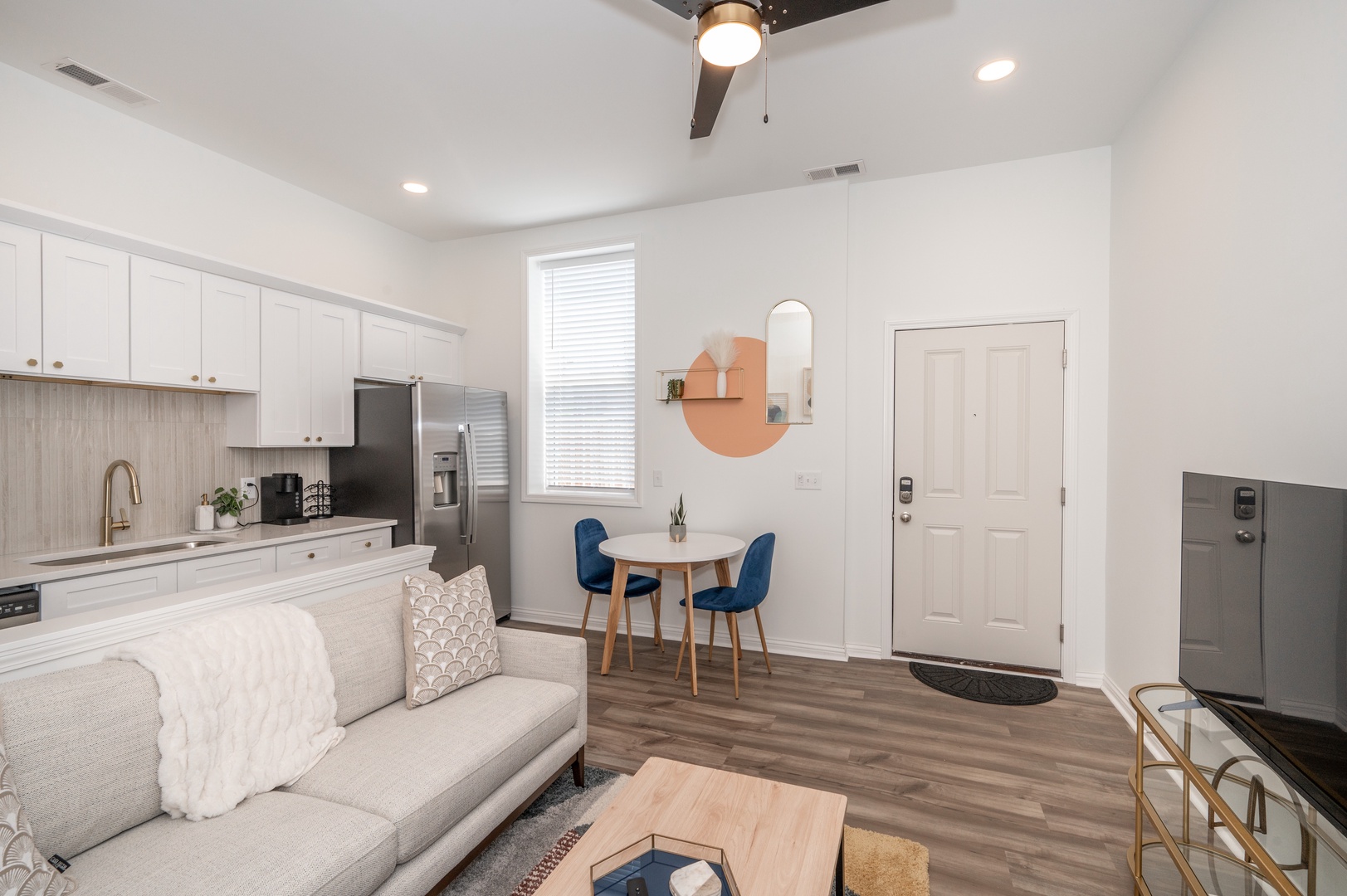 Unit 202: The bright, open main area offers a perfect place to relax