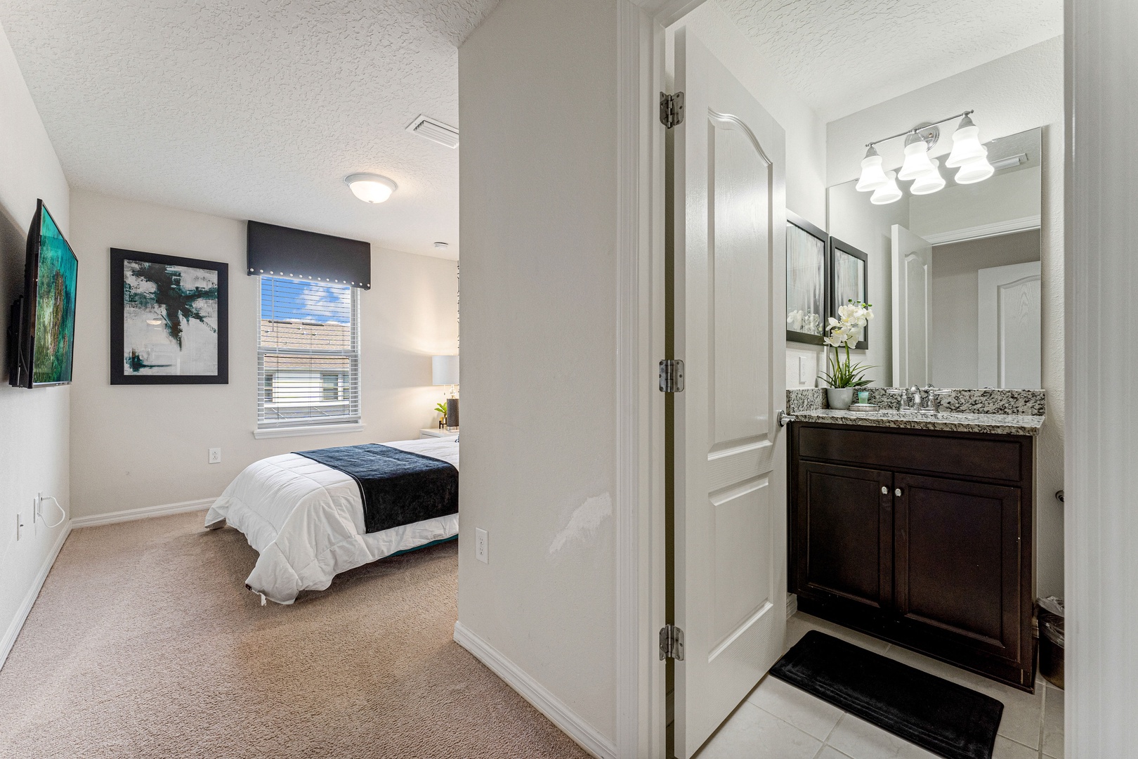 The queen suite boasts a private ensuite & smart TV