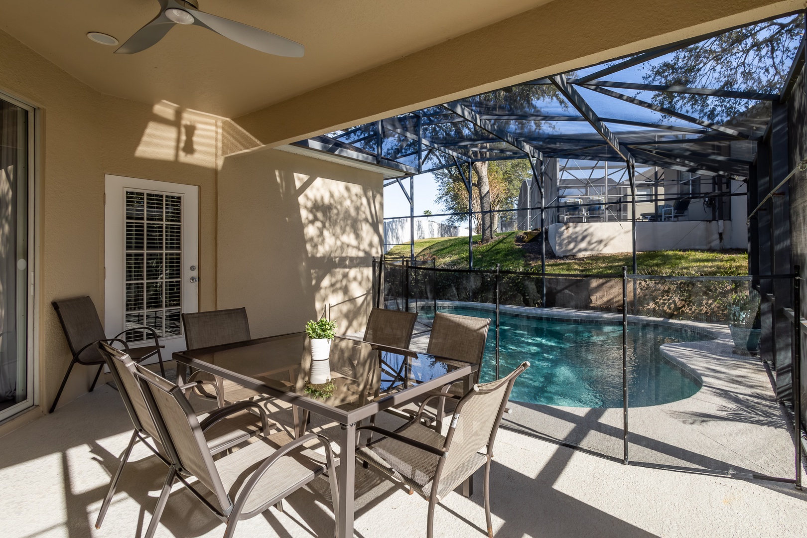 Dine alfresco or enjoy a cocktail on the screened patio