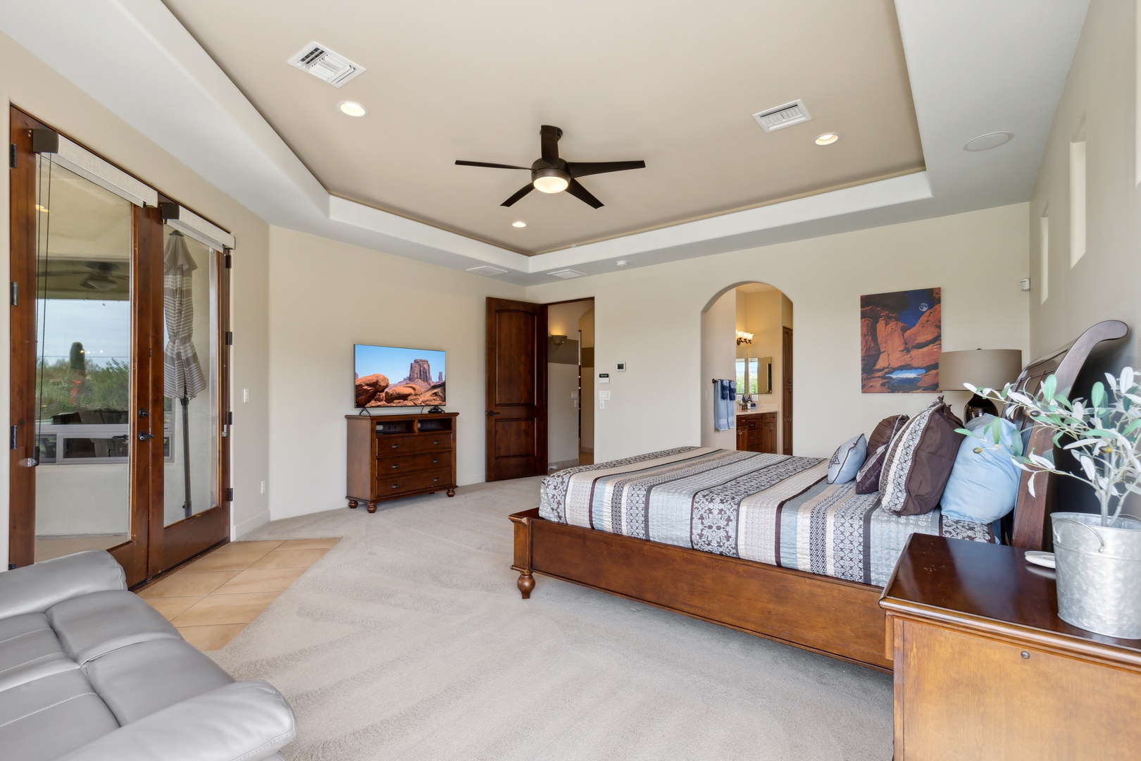 This king suite boasts a stunning view, private ensuite, & patio access