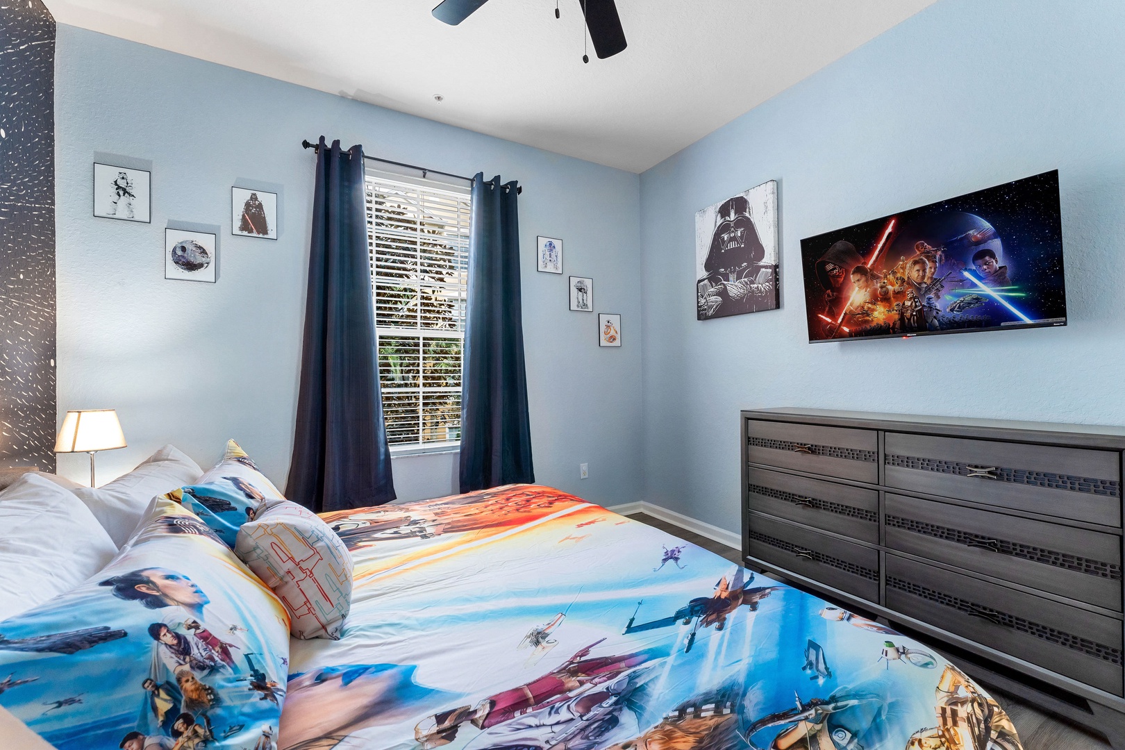 "May the Force be with you" Star Wars themed room with king bed, TV, and ensuite