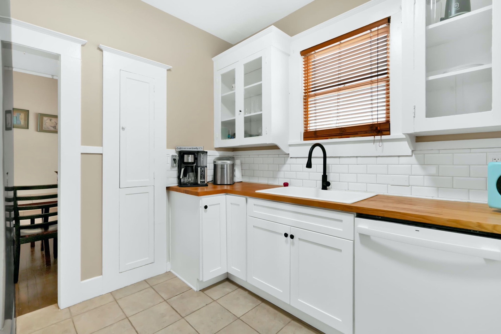 The welcoming kitchen provides ample space & all the comforts of home