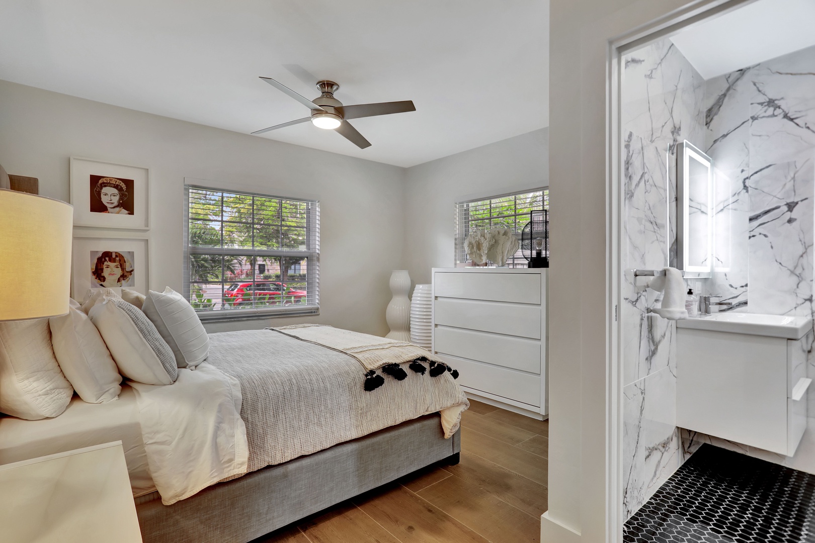 The final bedroom retreat showcases a plush queen bed & ensuite bath