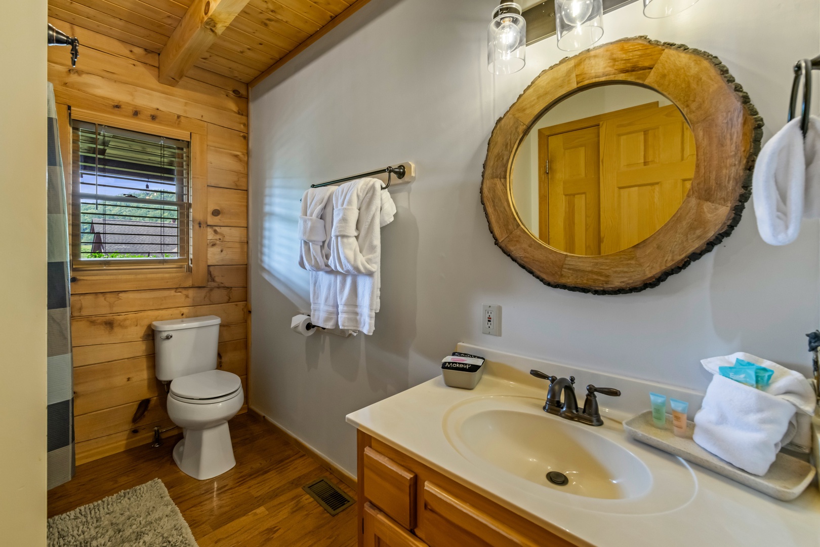 The full bath on the main floor includes a single vanity & shower/tub combo