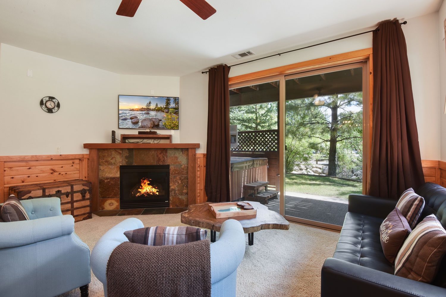 Living room has SmartTV & fireplace