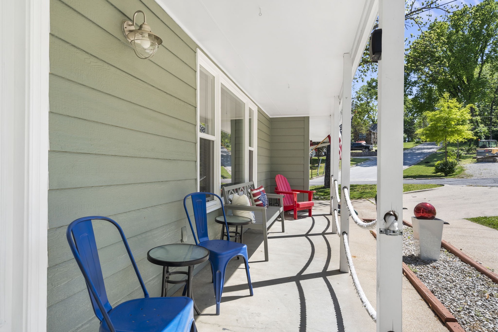 Sit back & relax in the fresh air on the front porch