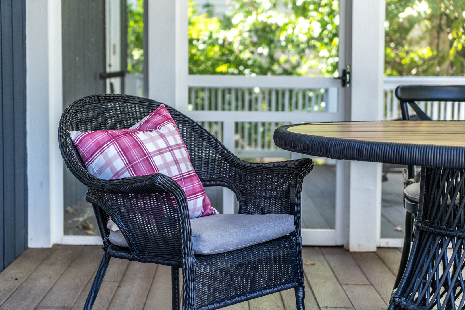 Enjoy a meal on the screened-in porch