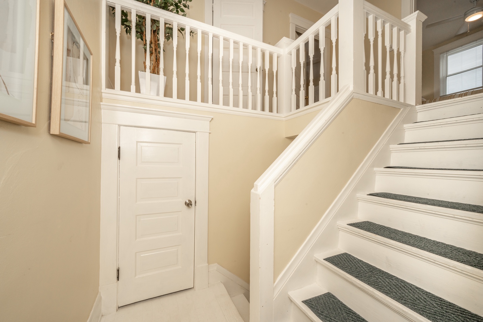 This home’s historic charm continues even throughout the staircase