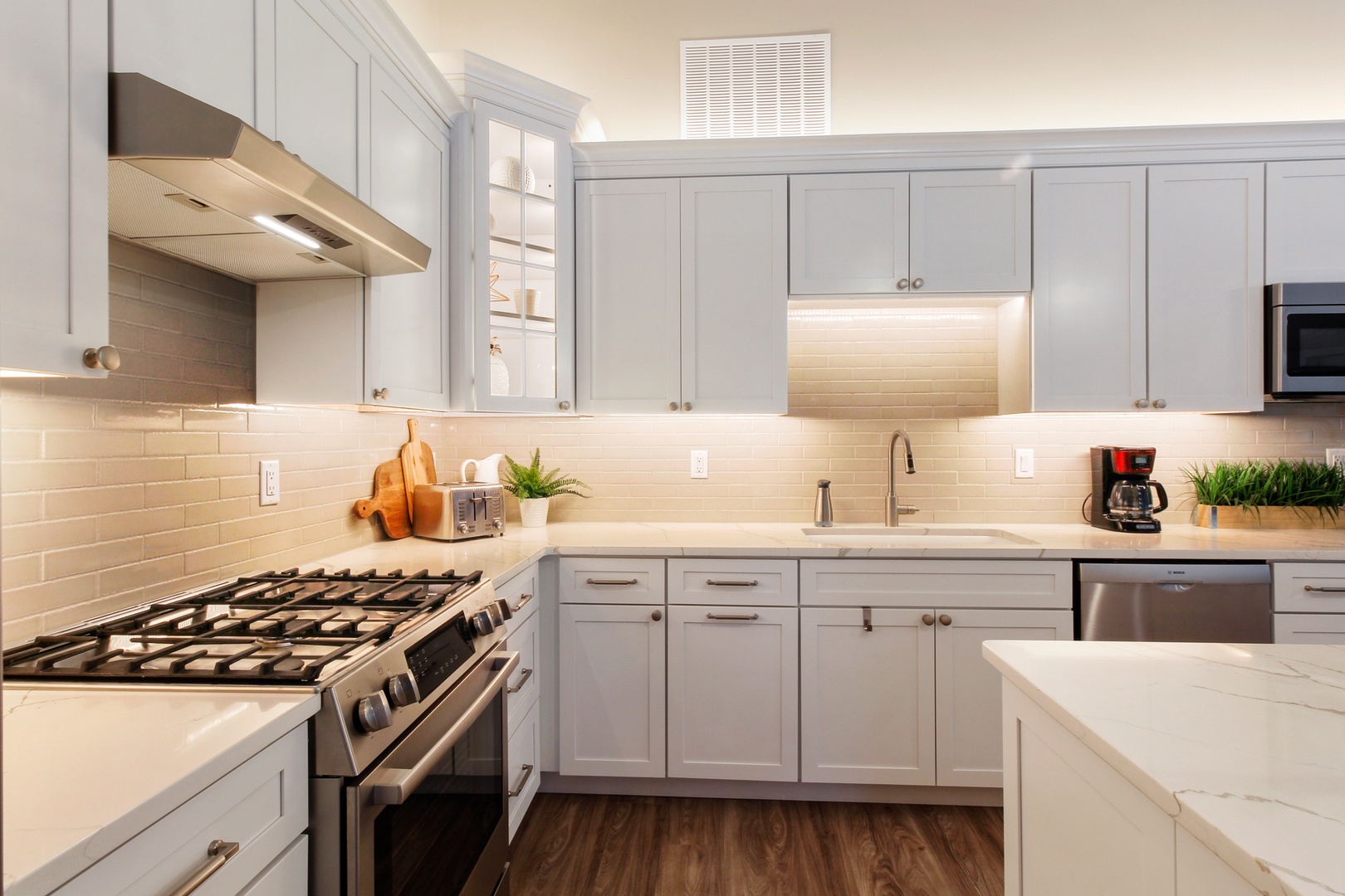 The grand kitchen offers loads of space & all the comforts of home