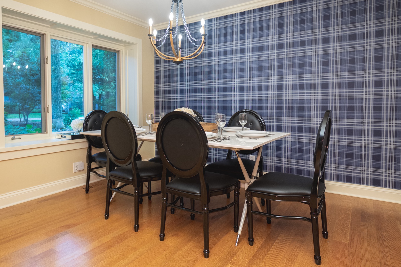 Elegant meals can be enjoyed at the dining table, offering seating for 6