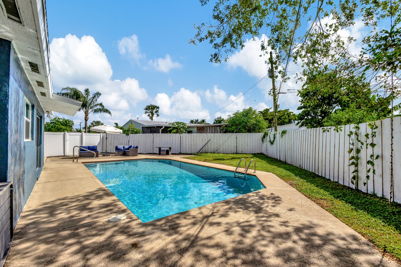 Back yard with private pool and outdoor seating