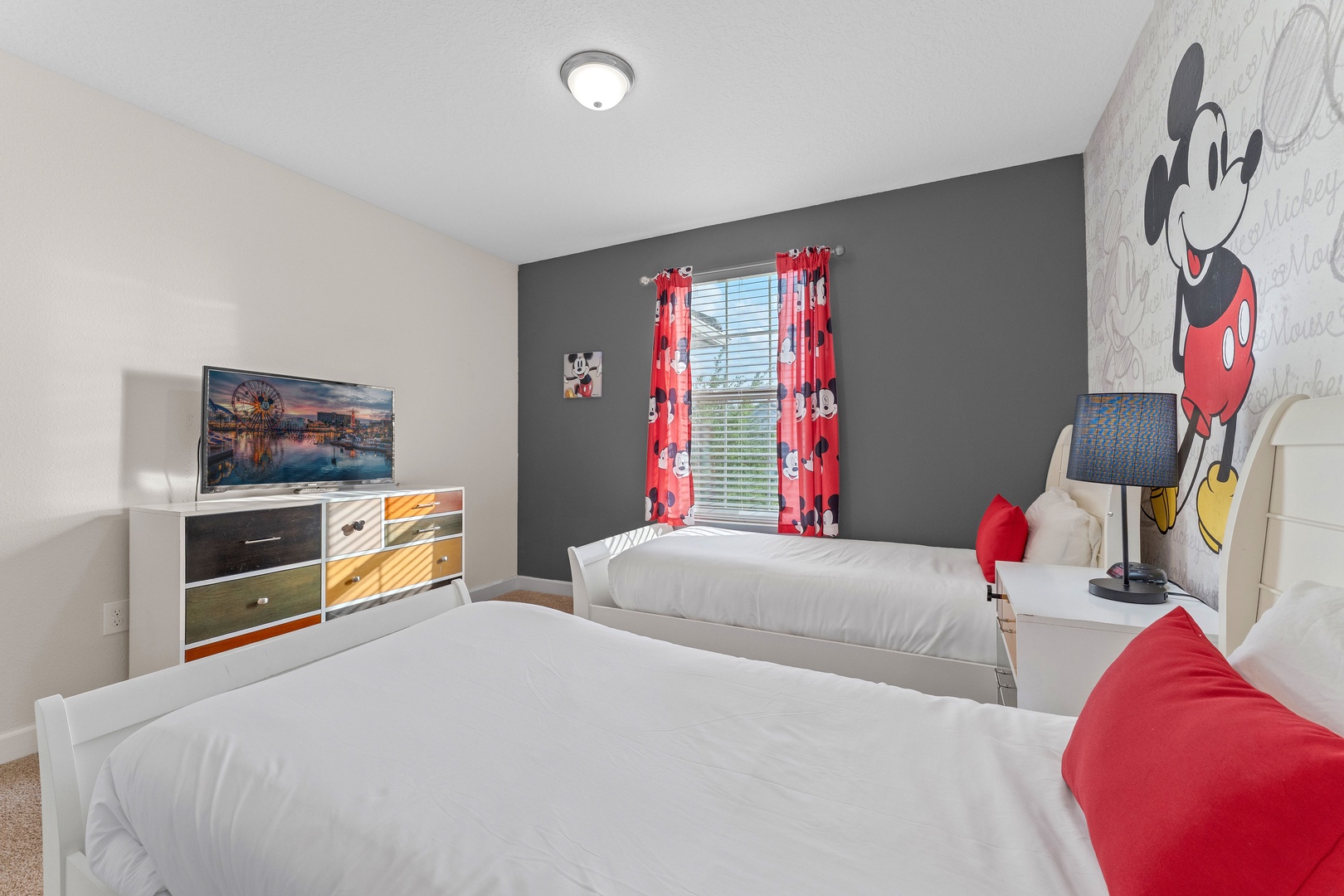 Bedroom 5 Mickey Mouse themed with 2 twin beds and TV