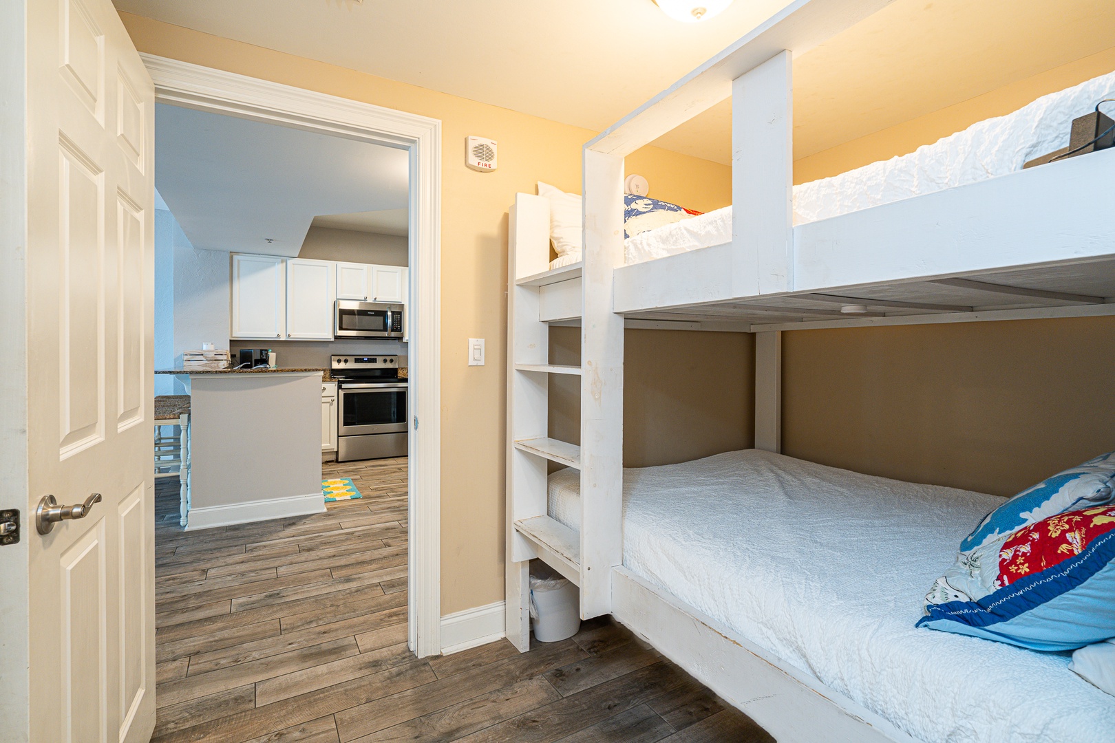 The second bedroom includes full over full bunks & private ensuite