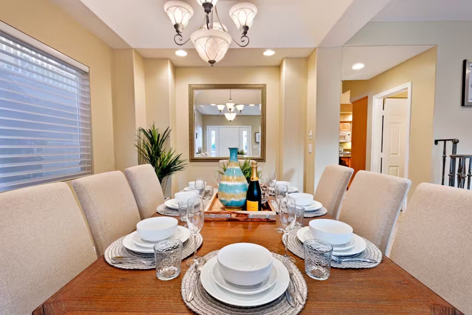 The formal dining area is ideal for sit-down meals, comfortably seating up to 10 guests