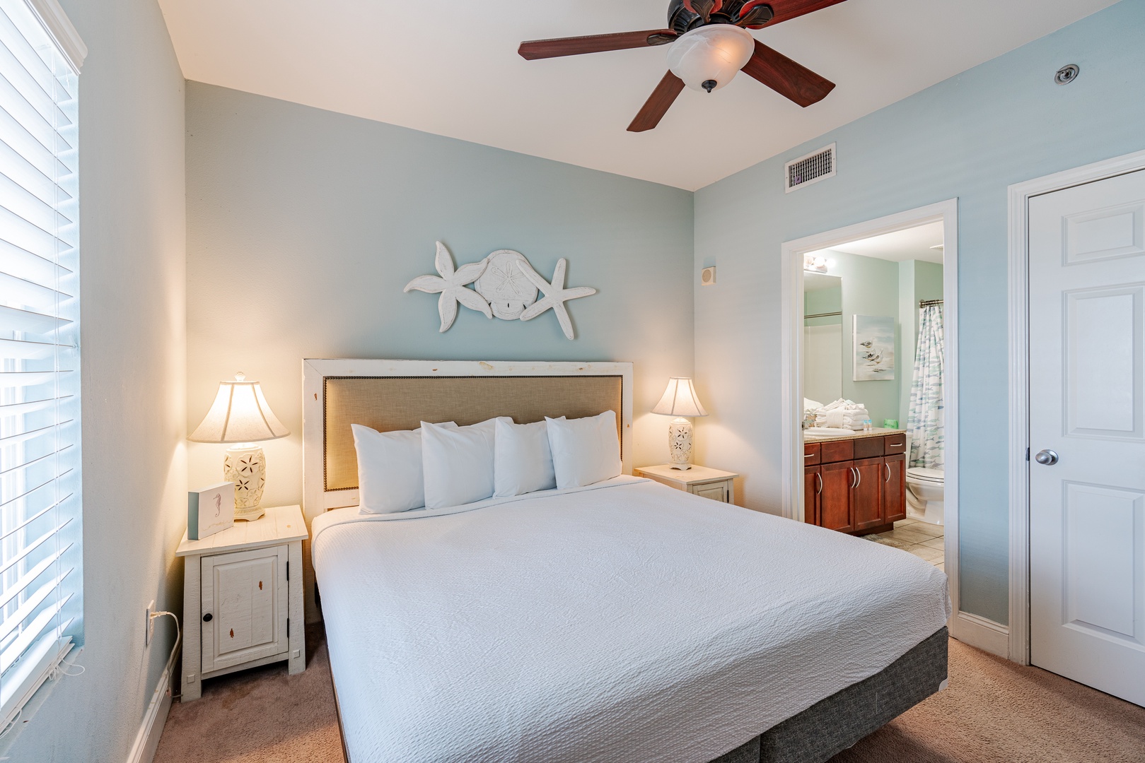 The king suite offers a private en suite, Smart TV, & ceiling fan