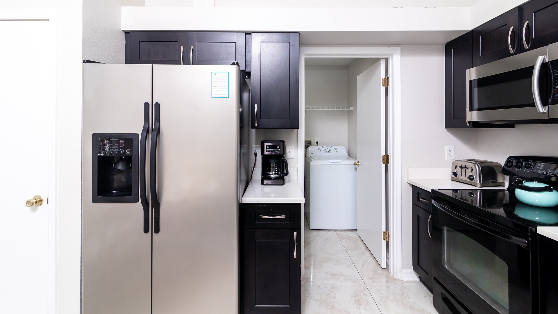 Kitchen with laundry room accessibility