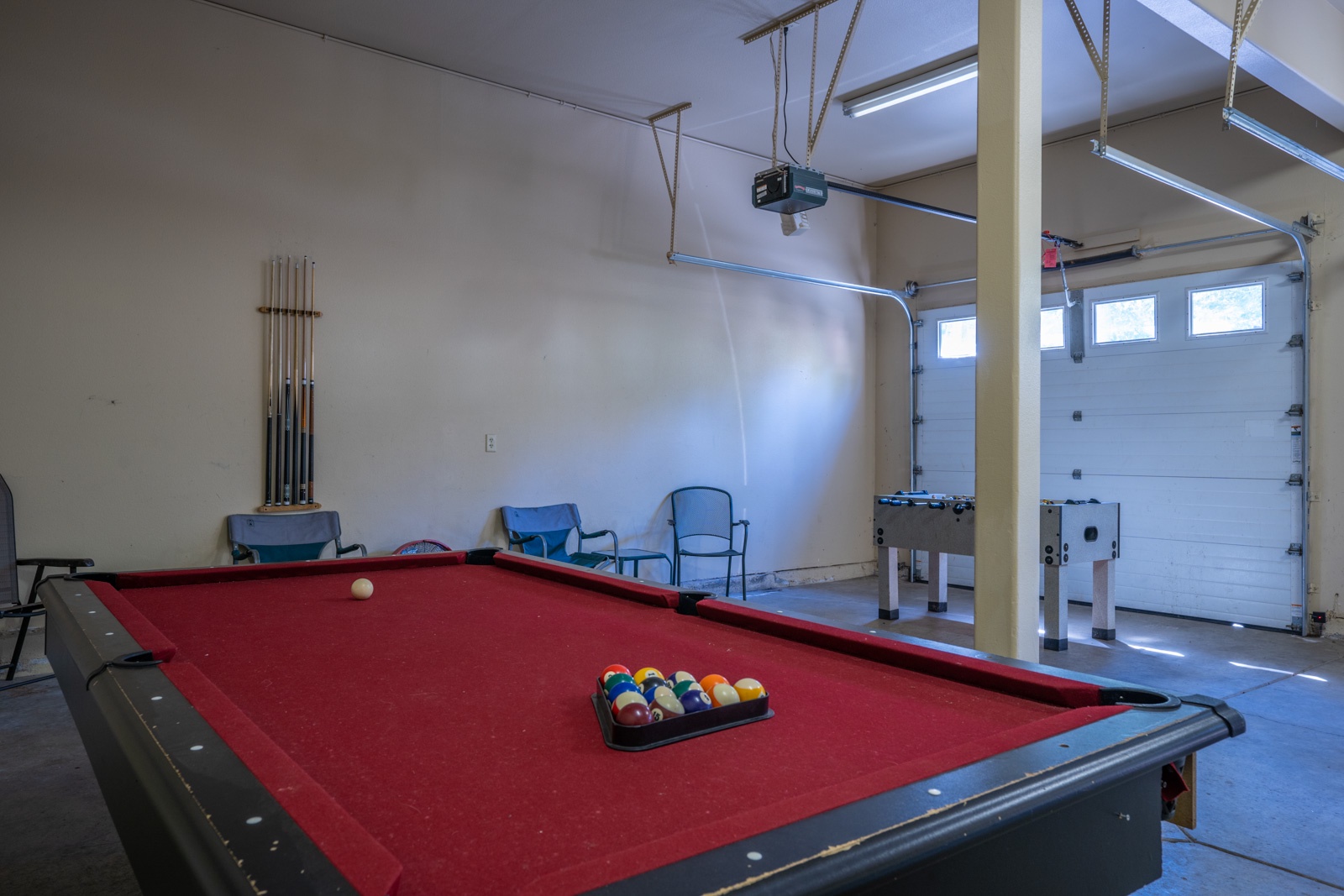 Unleash your competitive side with pool & foosball in the garage game area