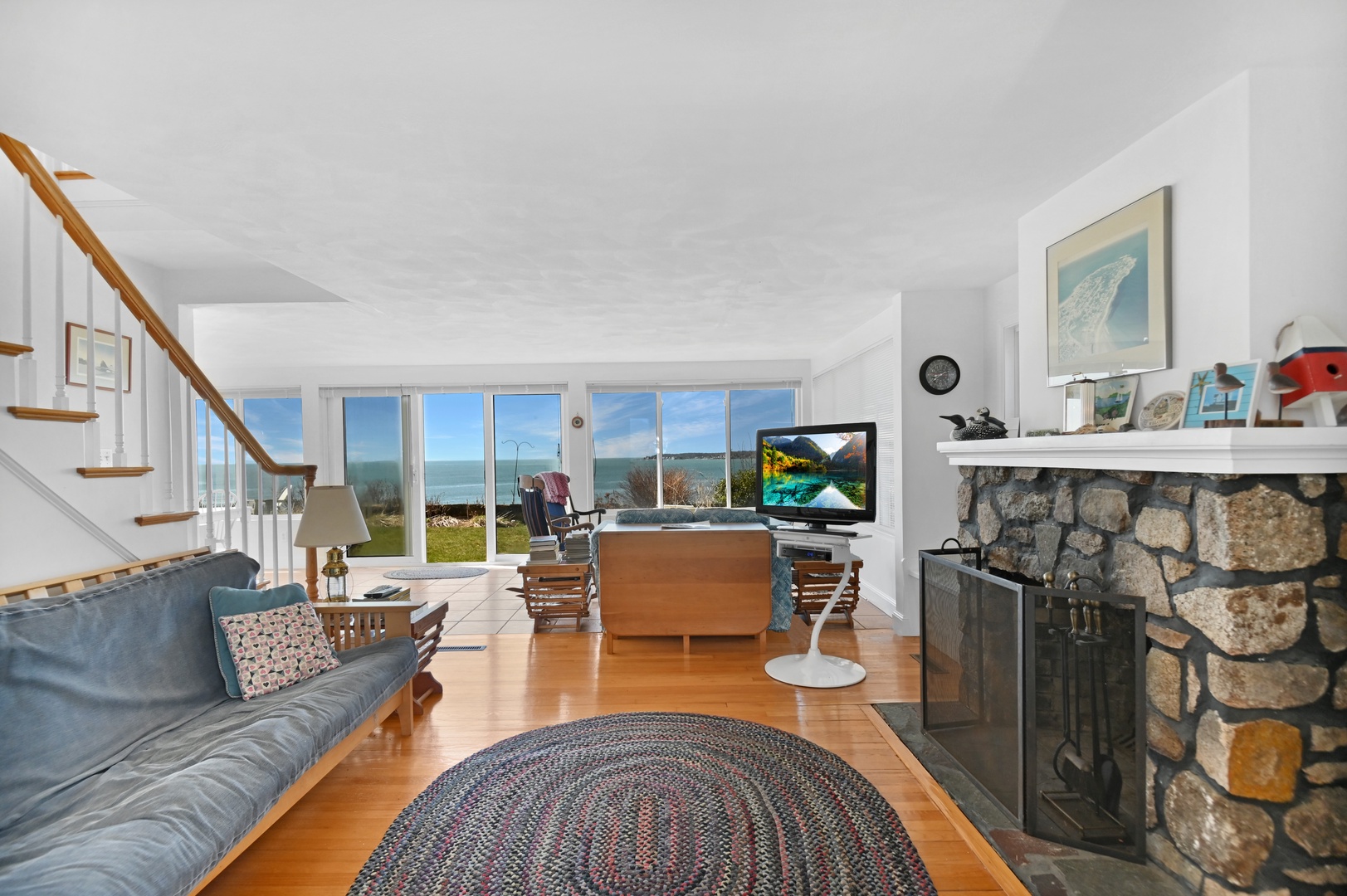 Downstairs living area with cozy seating and TV