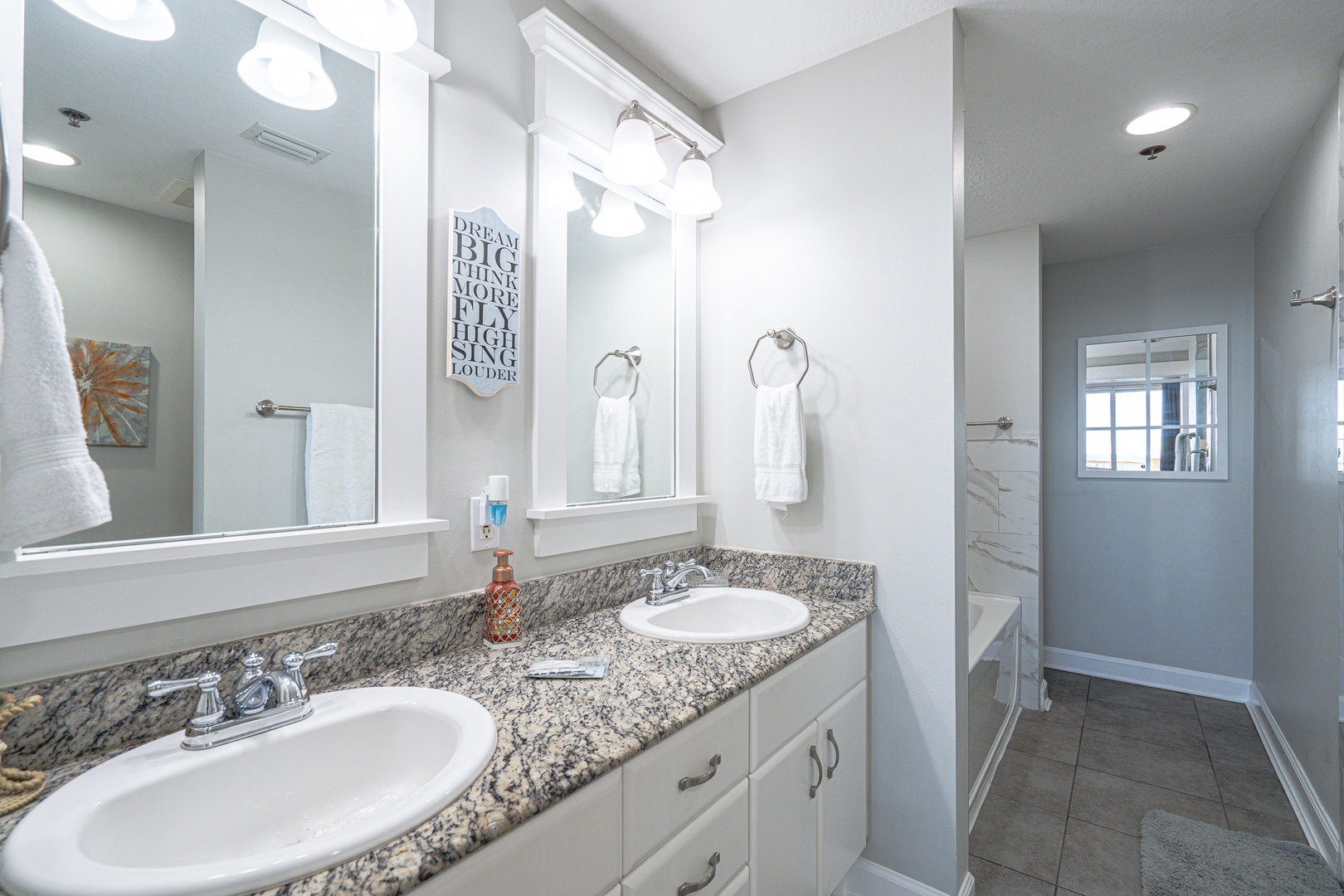 This full ensuite provides a shower, soaking tub and double vanity
