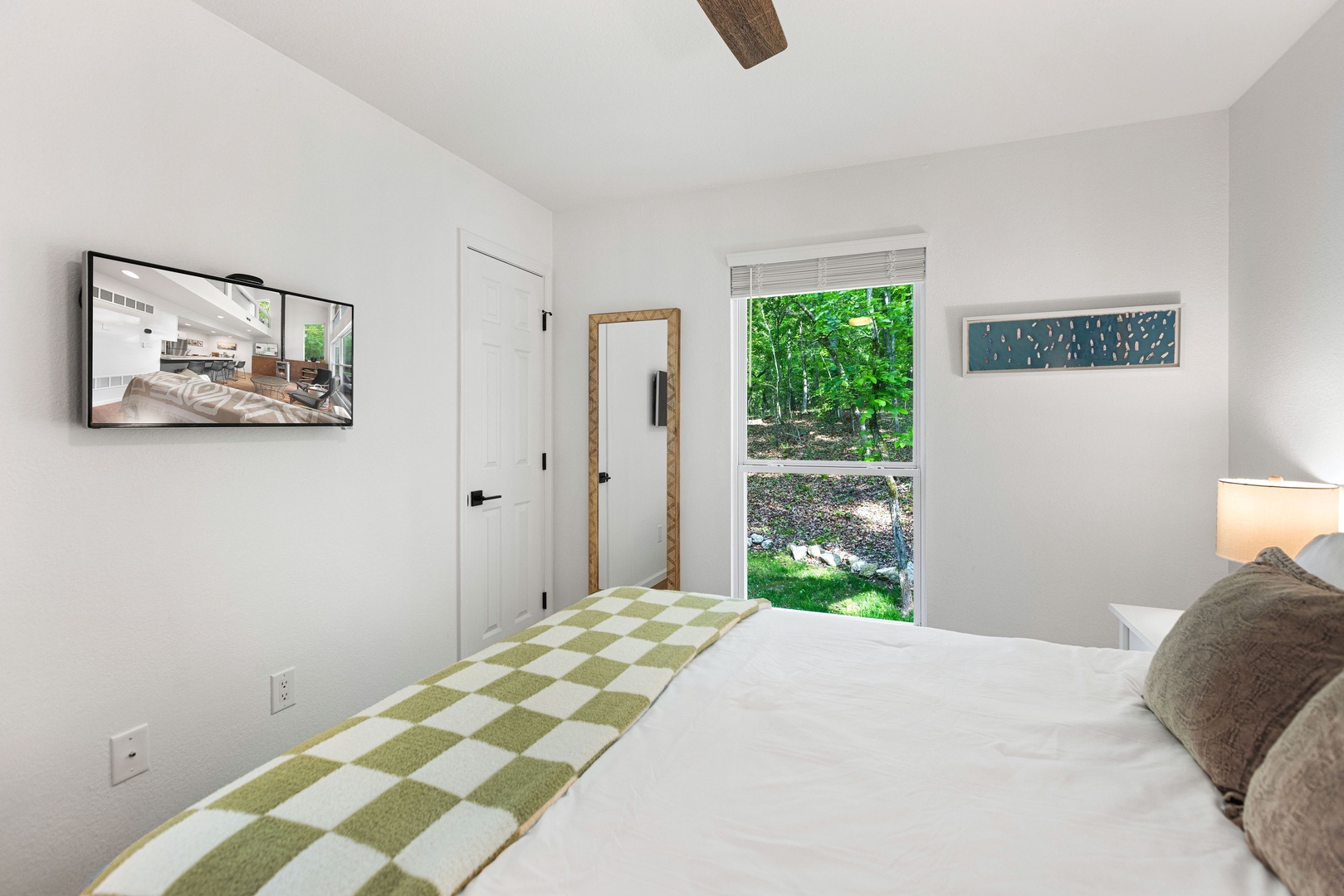 The 1st of 2 second-floor queen suites off the Jack & Jill bath, with Smart TV