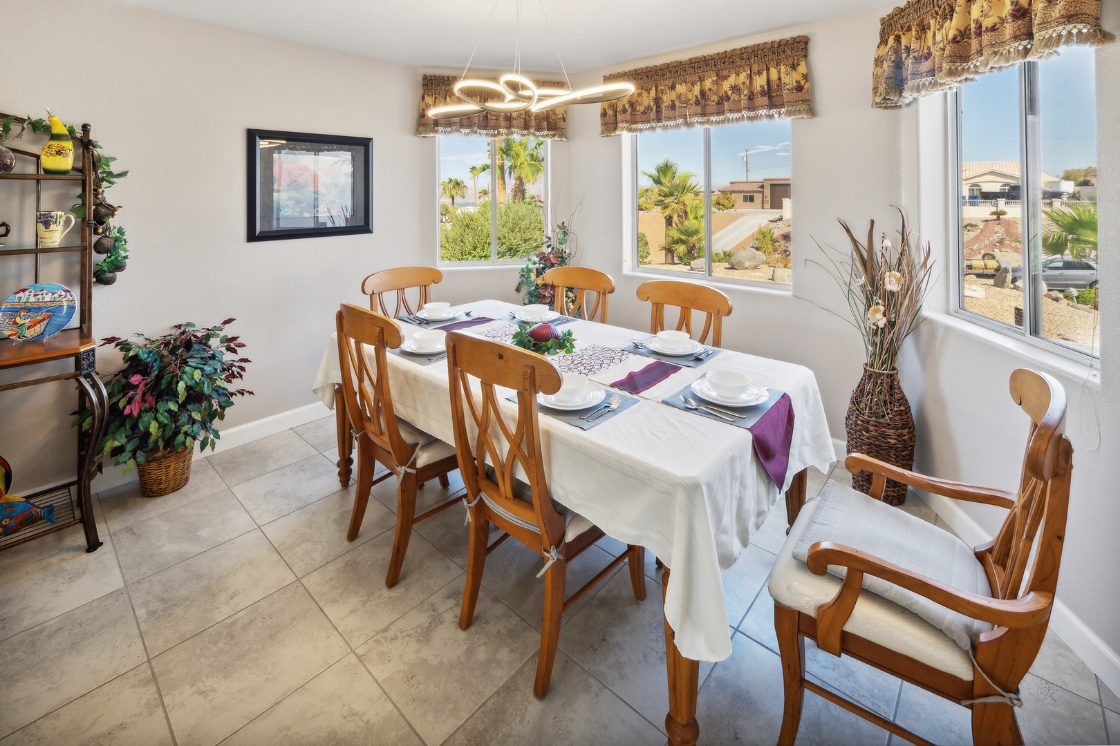 Gather for meals with a lake view at the dining table, seating 6