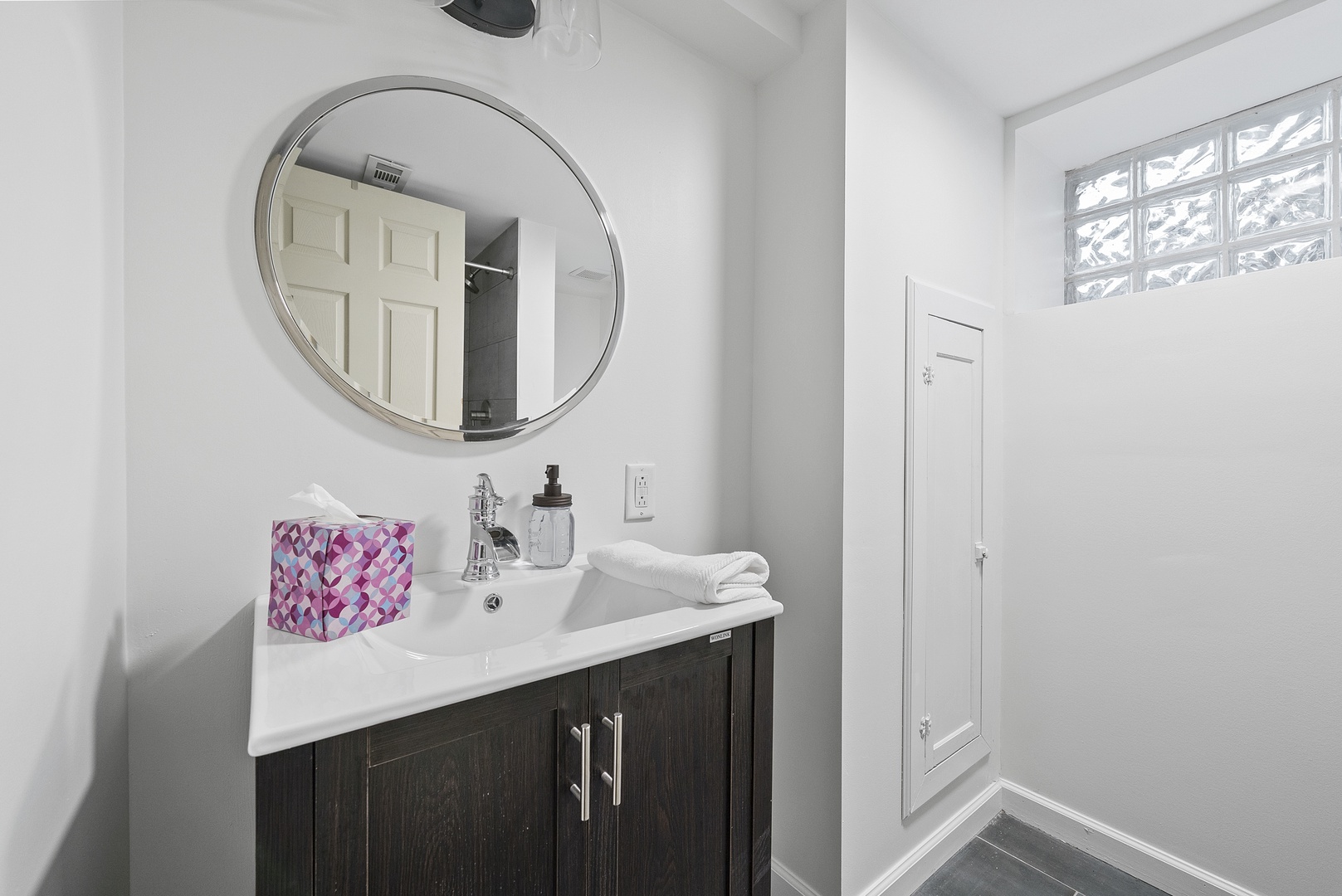 A second full bath with a walk-in shower is available in the basement