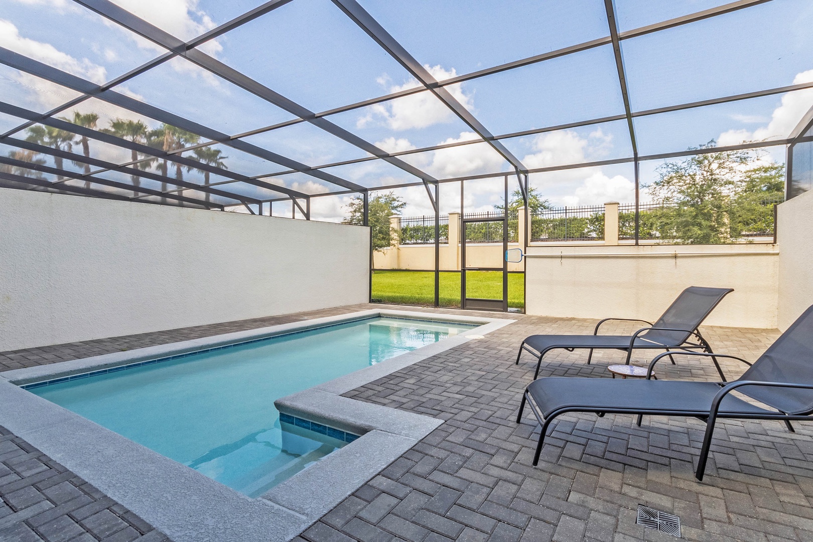 Private pool with lounge chairs, outdoor dining, and gas BBQ grill