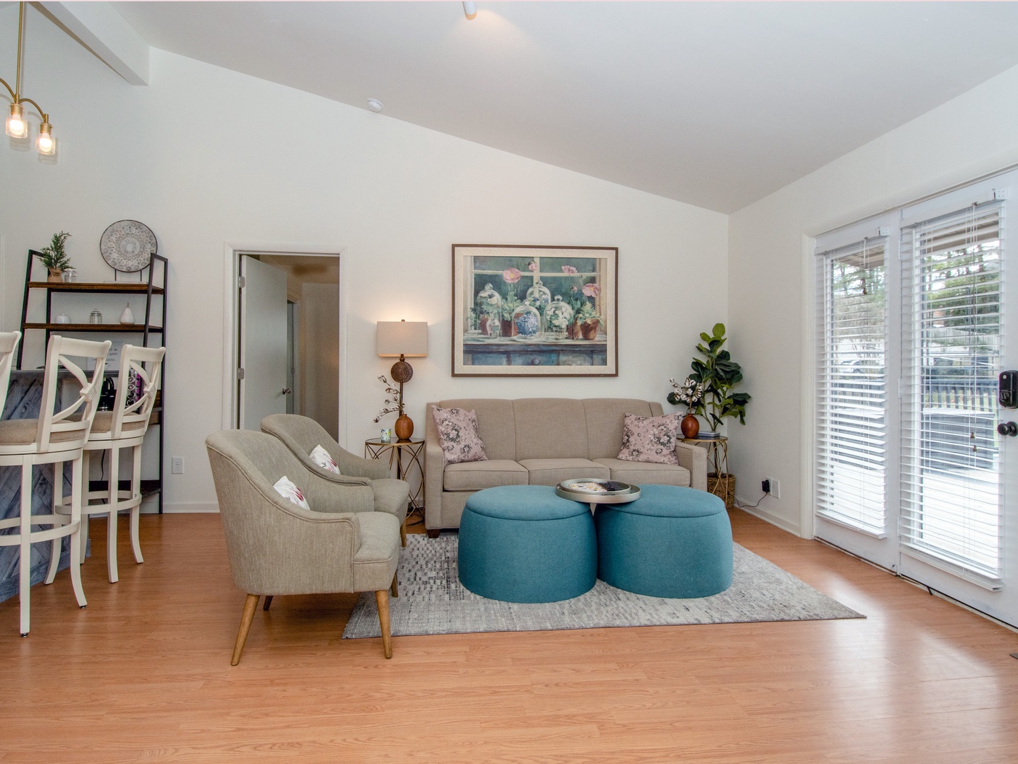 Living room with Smart TV and balcony