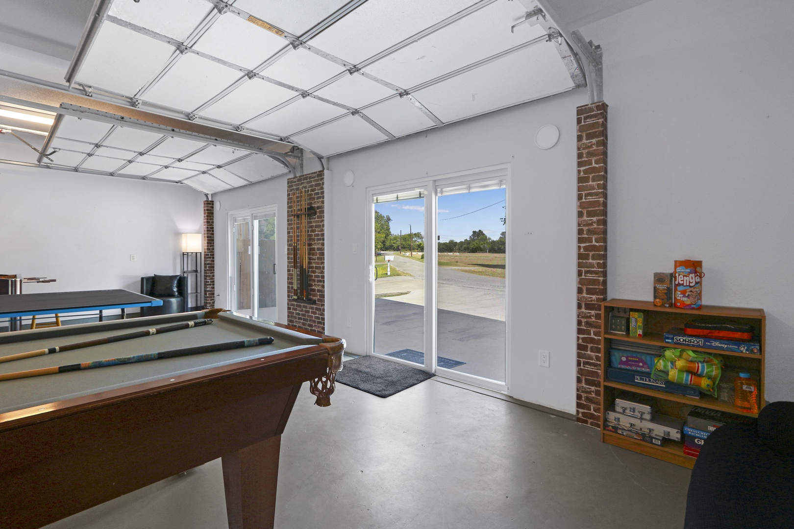 The 1st floor game room is the perfect hang-out spot with games & amenities