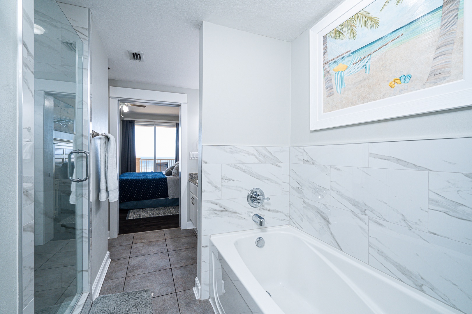 This full ensuite provides a shower, soaking tub and double vanity