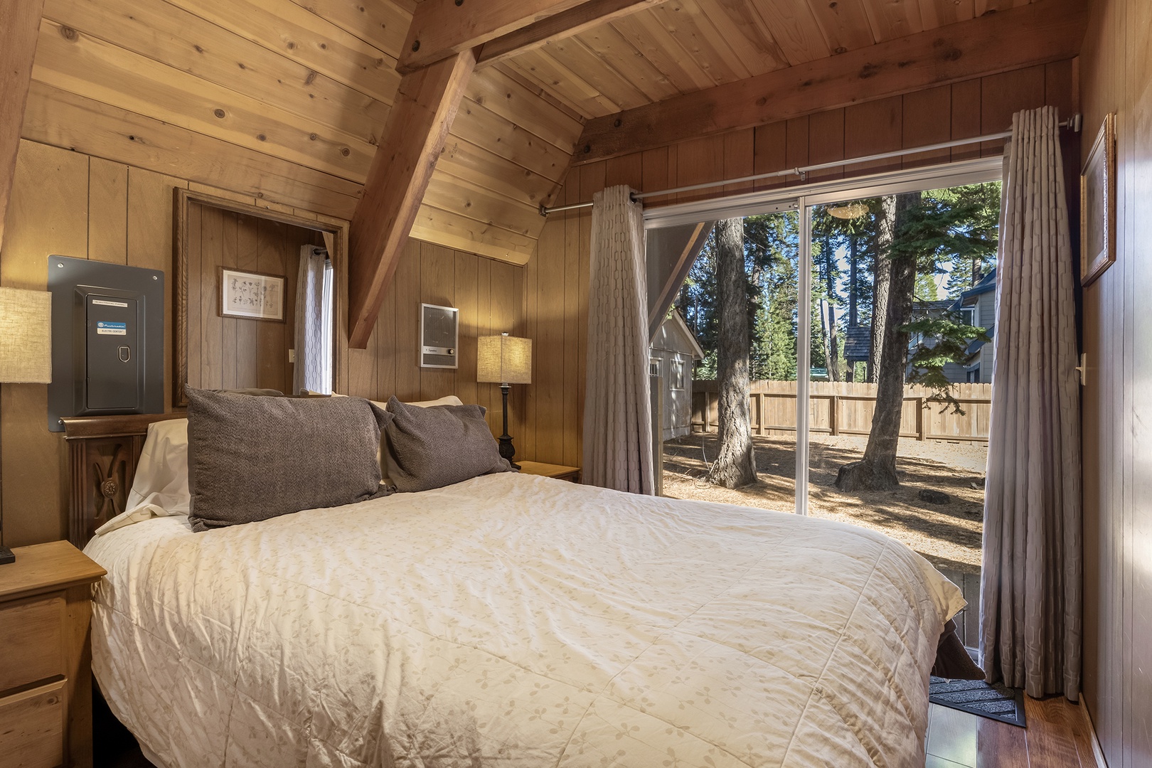 Recharge in this inviting queen bedroom with patio access