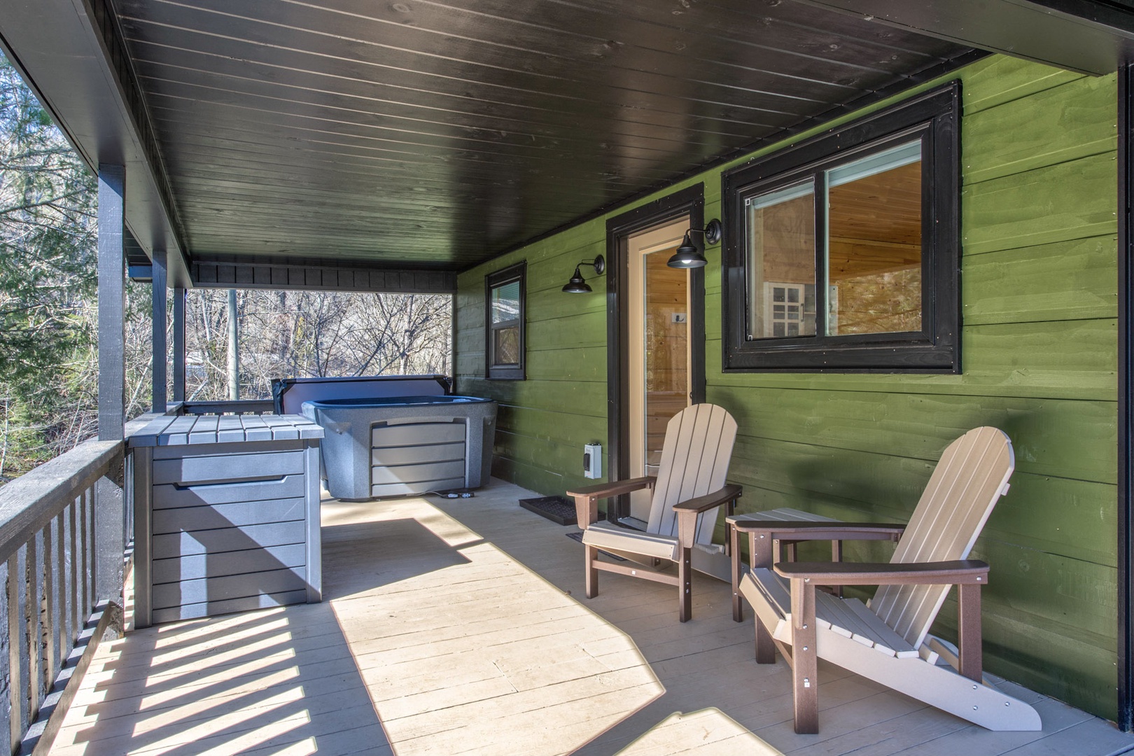 An idyllic retreat: chairs & hot tub, perfect for relaxation