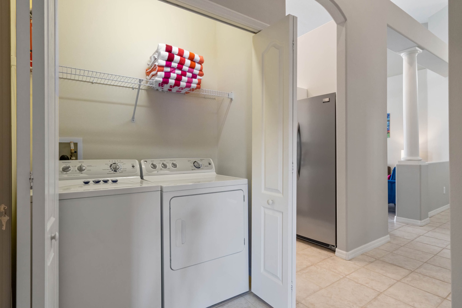 Enjoy the convenience of Private Laundry, tucked away in a hall closet