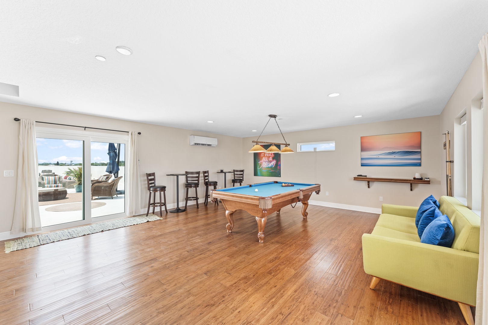 Game room with pool table, Smart TV, murphy bed, and dual decks