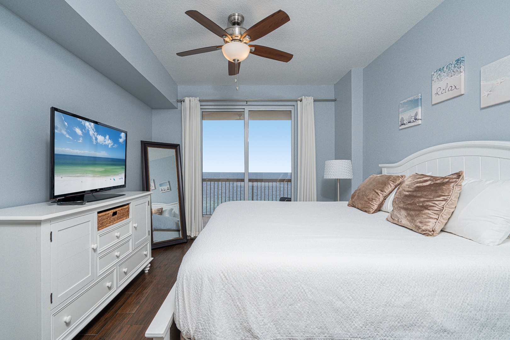 The serene king suite boasts a private ensuite, balcony access,  Smart TV