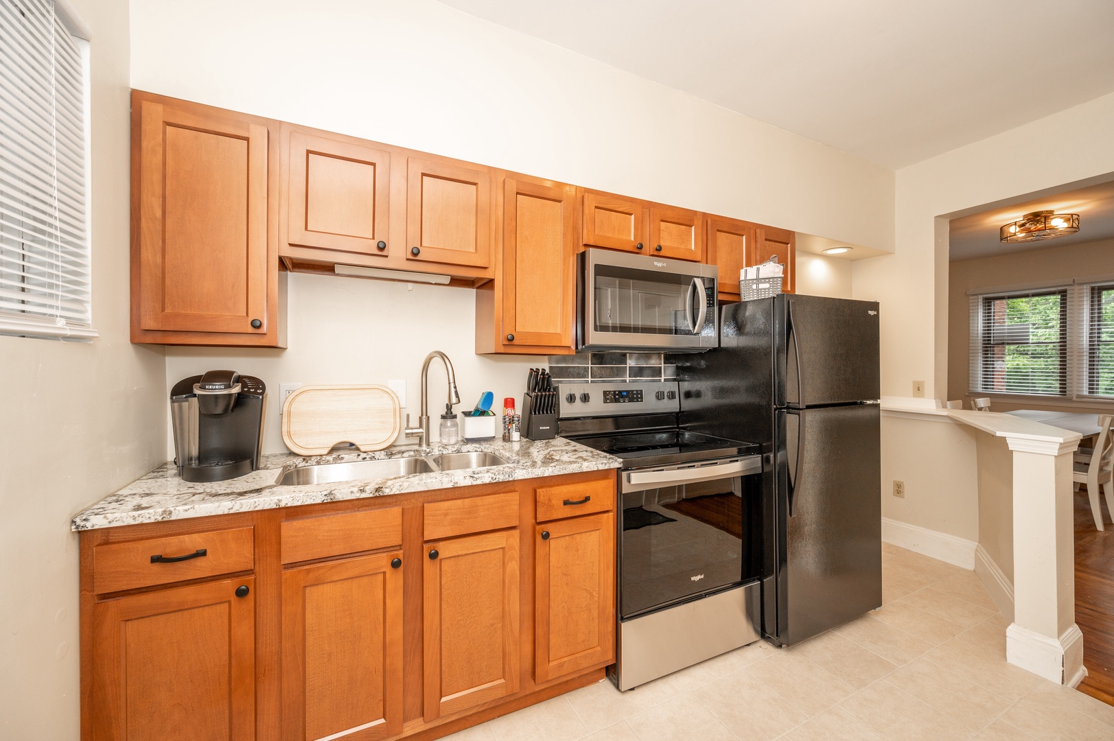 The open, airy kitchen offers ample space & all the comforts of home