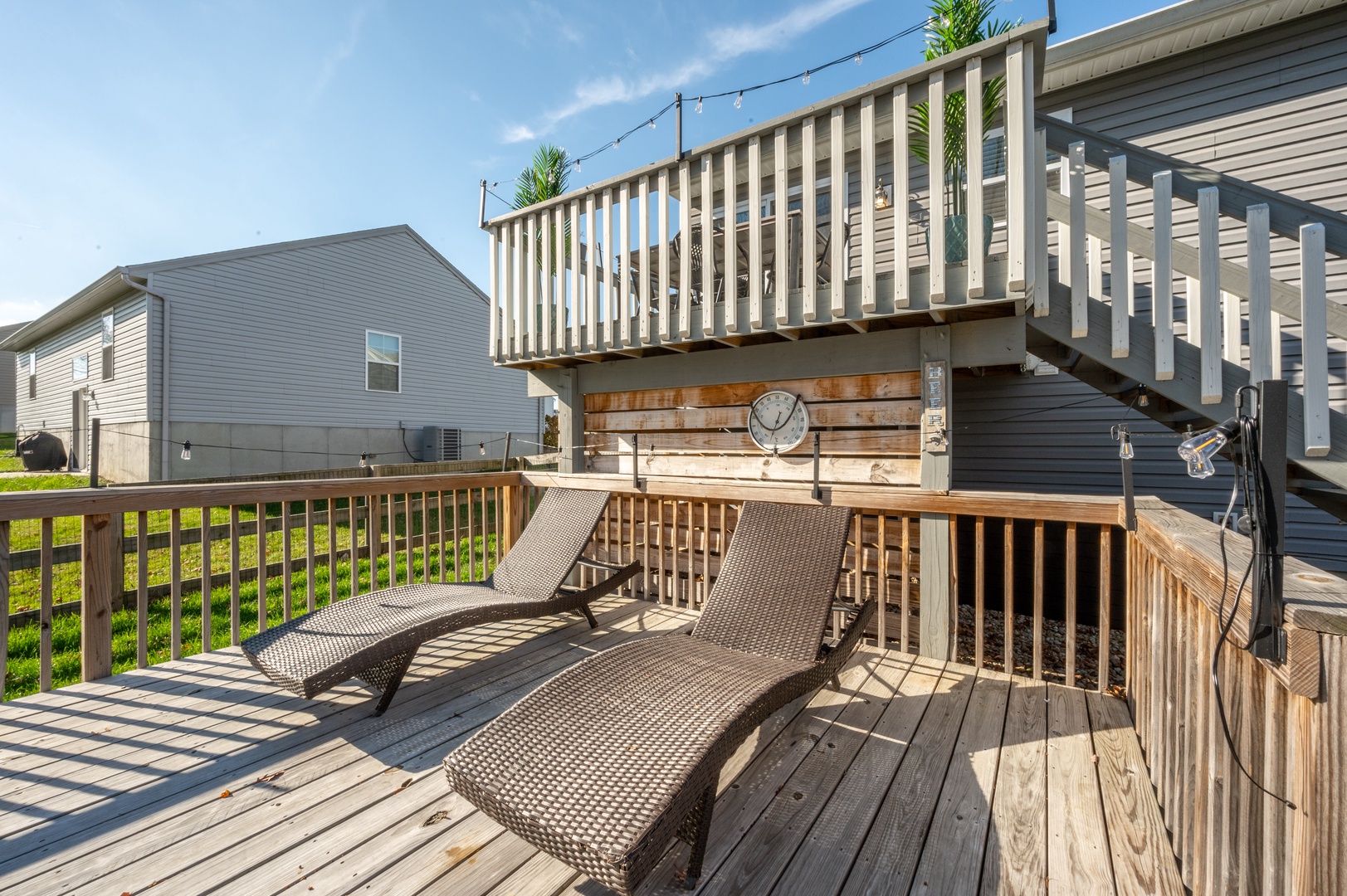 Lounge the day away on the sunny back deck